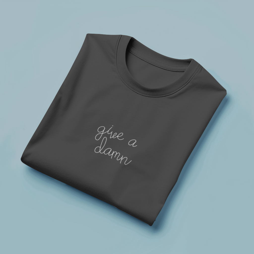 GIVE A DAMN Tee